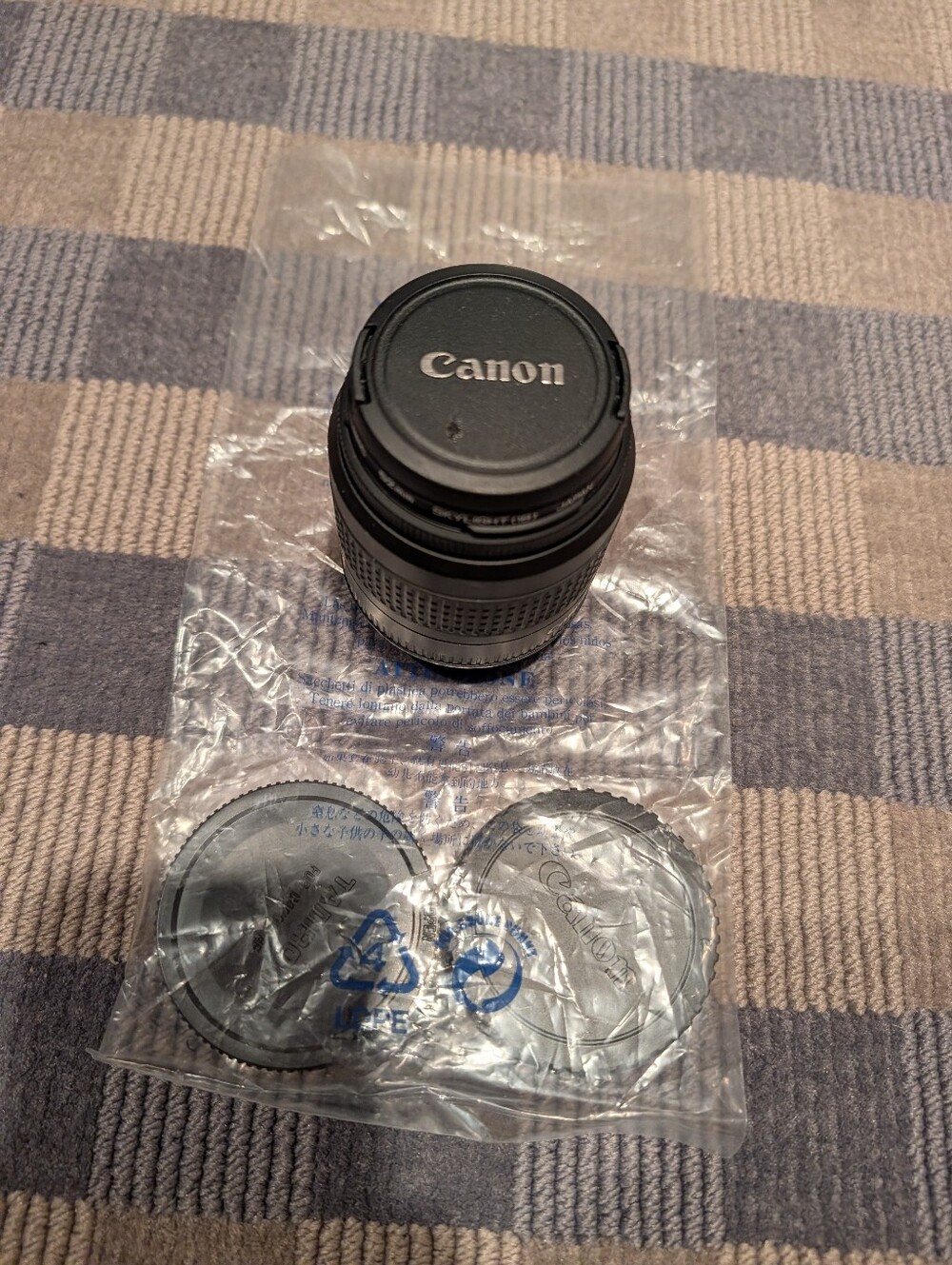 This is a used Canon EF 35-80mm f/4- Black Camera Lens - Compact Prime/Zoom Lens